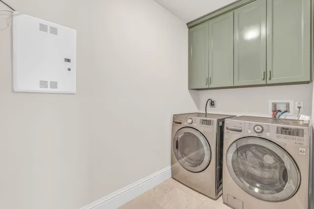 a view of a hallway with a chandelier