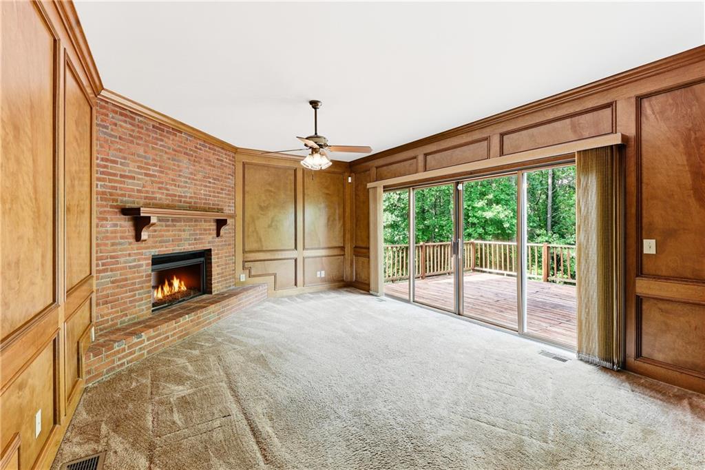 3608 Maple Forge Lane Gainesville, GA 30504 - Photo 8 of 45 a view of an empty room with window and fire place