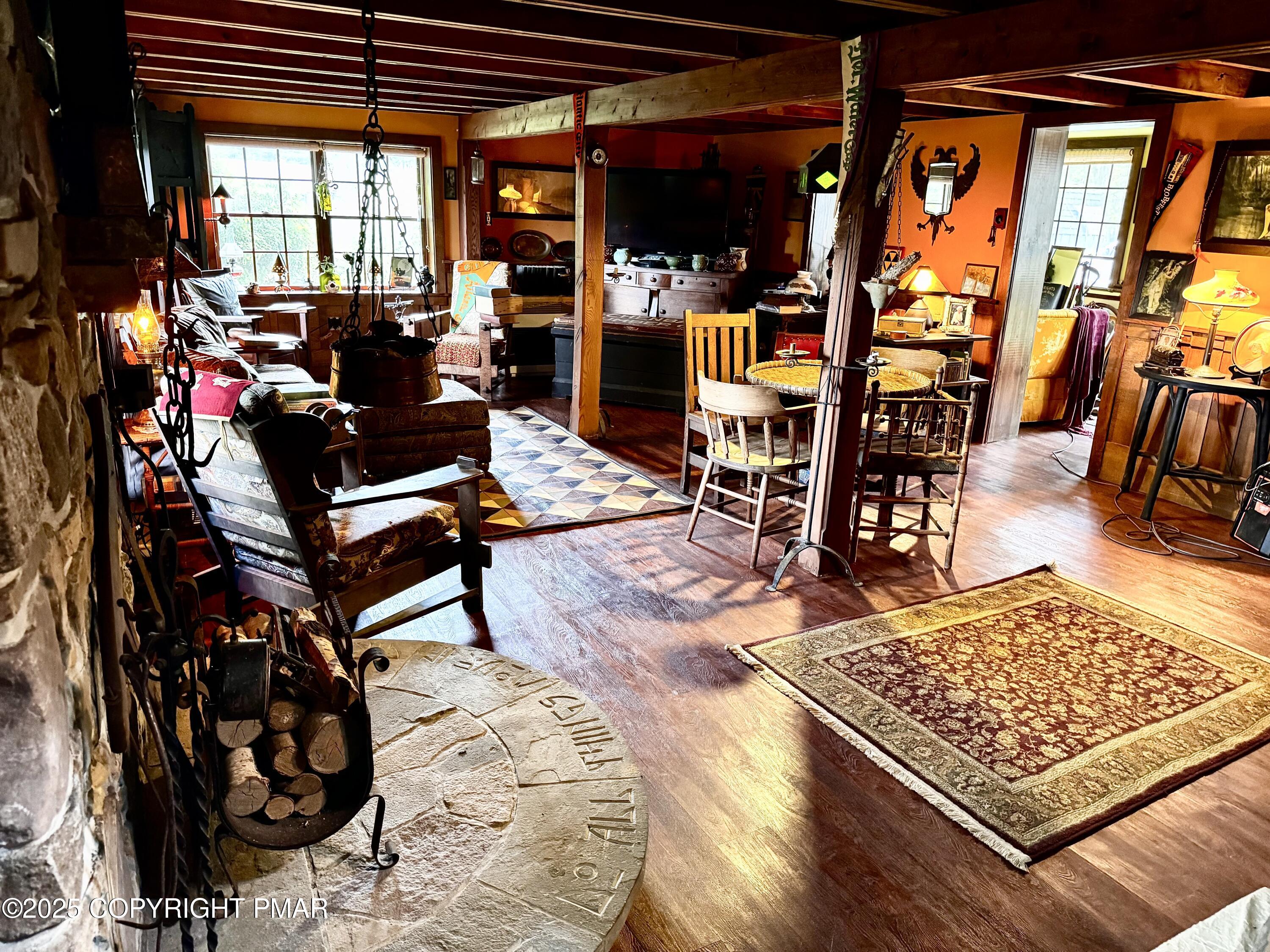 221 Pocono Road Pocono Summit, PA 18346 - Photo 15 of 28 family room toward sunroom
