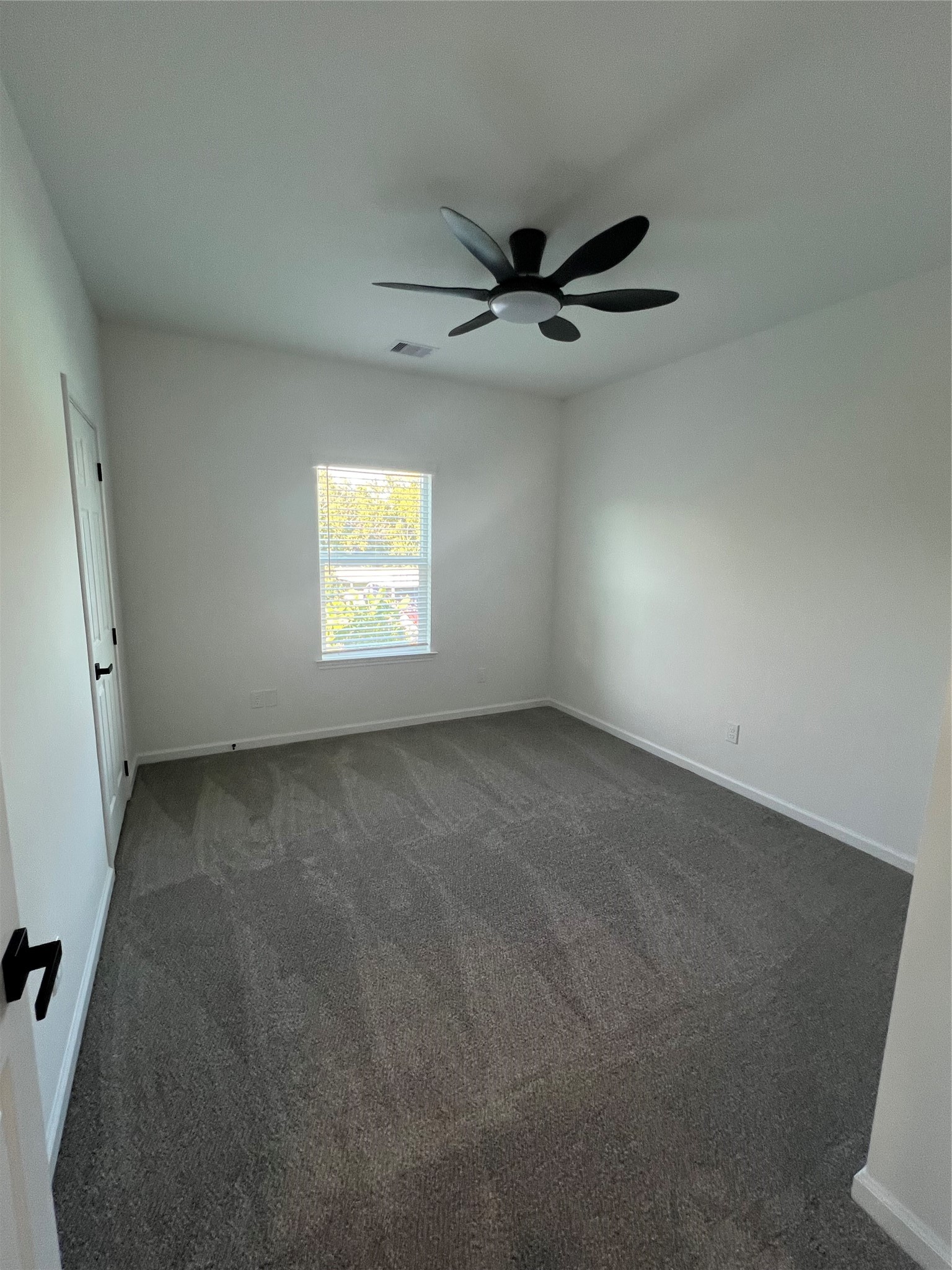 226 South Y La Porte, TX 77571 - Photo 12 of 21 an empty room with windows and fan