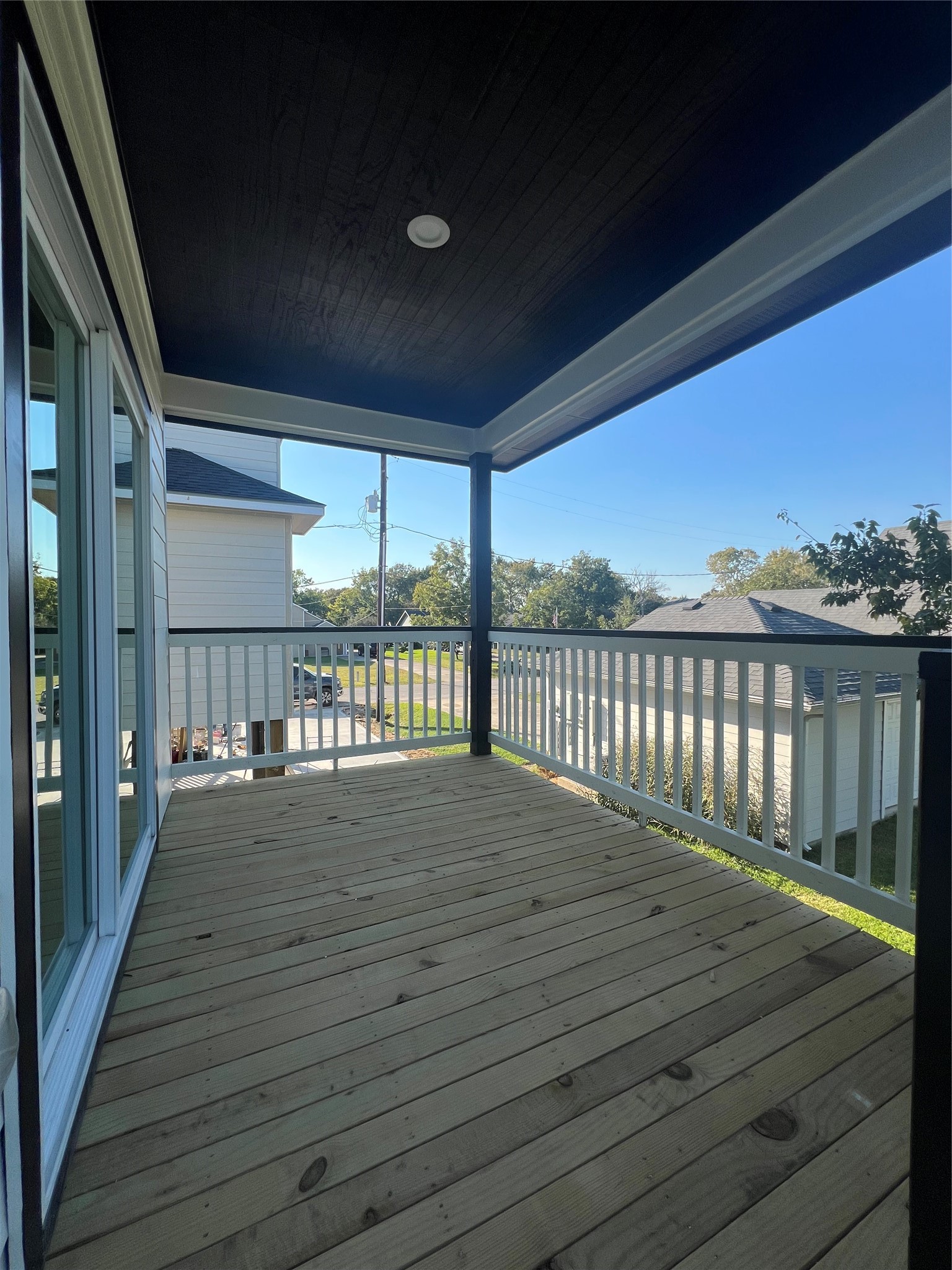 226 South Y La Porte, TX 77571 - Photo 7 of 21 a view of a deck with wooden floor and roof with floor to ceiling window