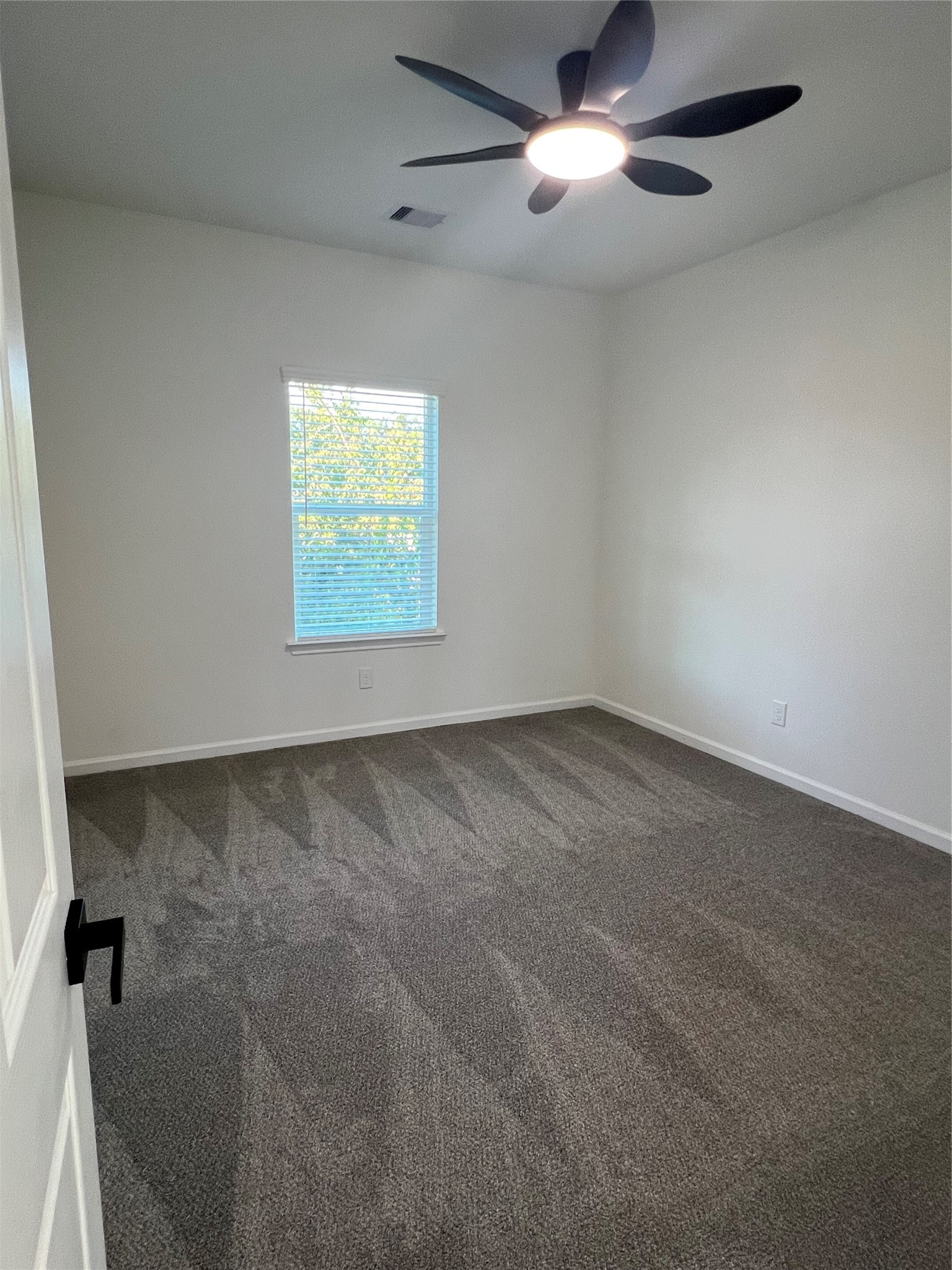 226 South Y La Porte, TX 77571 - Photo 10 of 21 an empty room with a ceiling fan and a window