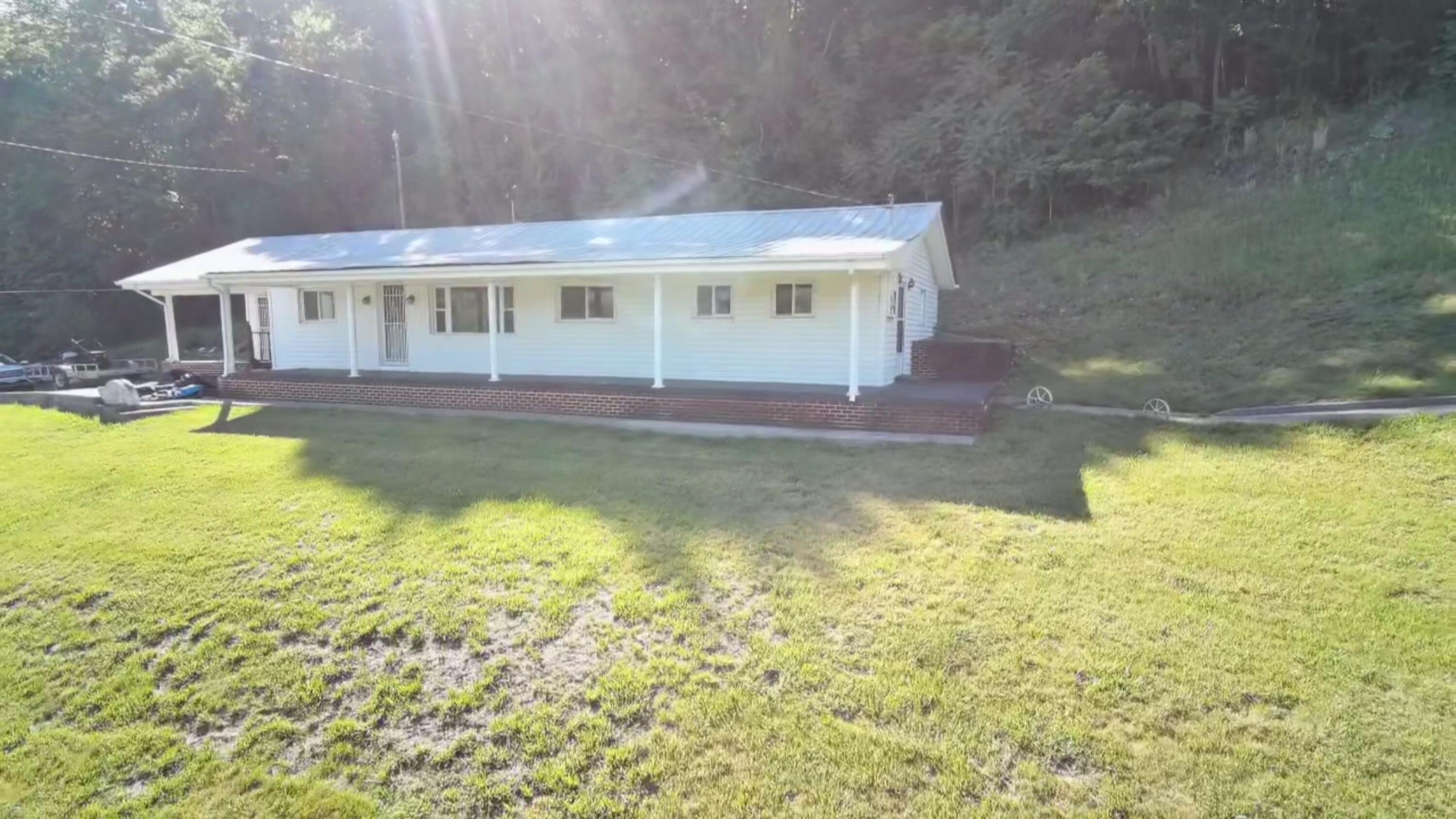 415 Stock Pen Mountain Road Narrows, VA 24124 - Photo 13 of 16 a view of house with swimming pool