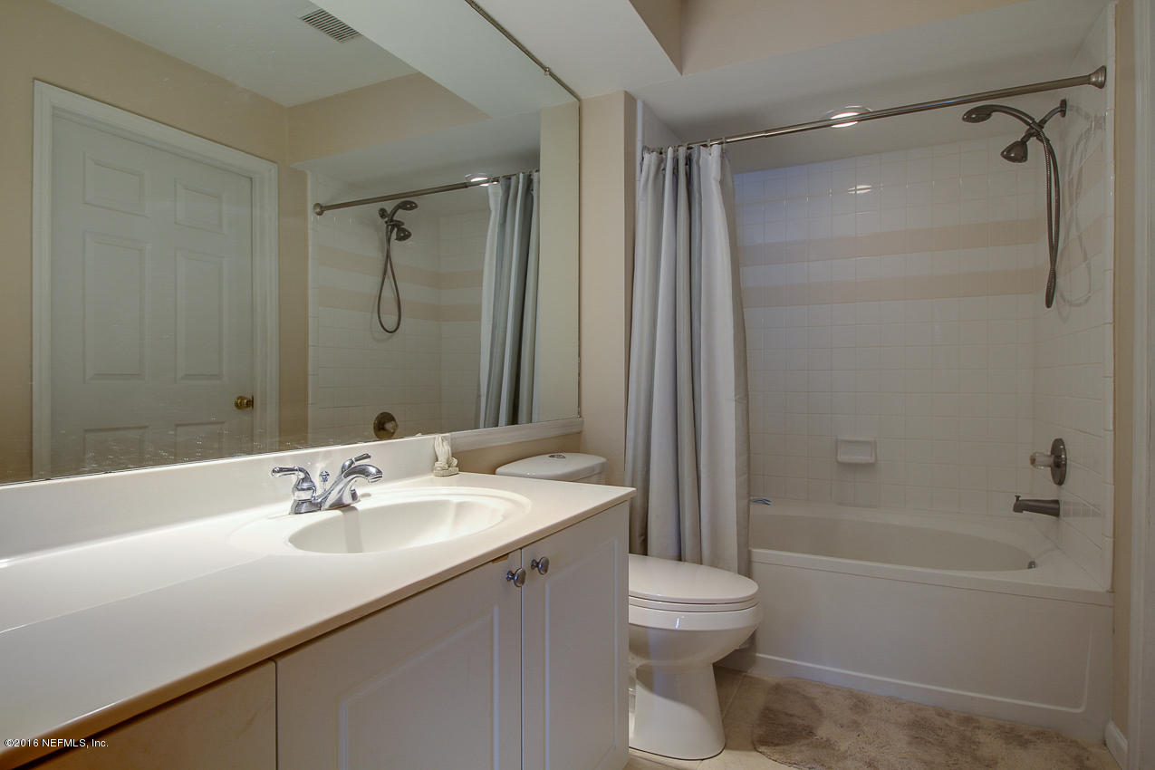 23583 Bahama Point Fernandina Beach, FL 32034 - Photo 15 of 37 a bathroom with a sink toilet tub and shower