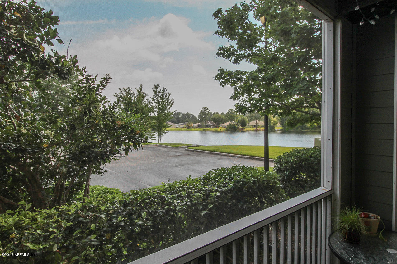 23583 Bahama Point Fernandina Beach, FL 32034 - Photo 16 of 37 a view of a wooden bridge with large tree