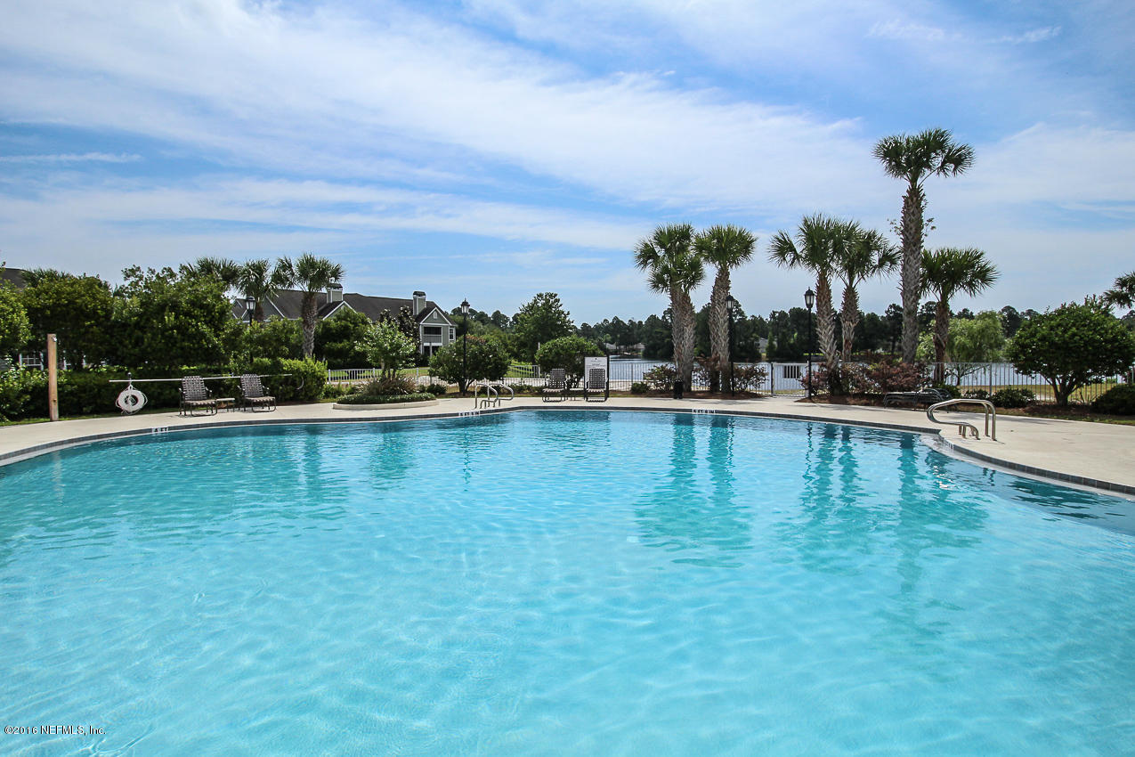 23583 Bahama Point Fernandina Beach, FL 32034 - Photo 30 of 37 a view of a swimming pool and an outdoor space