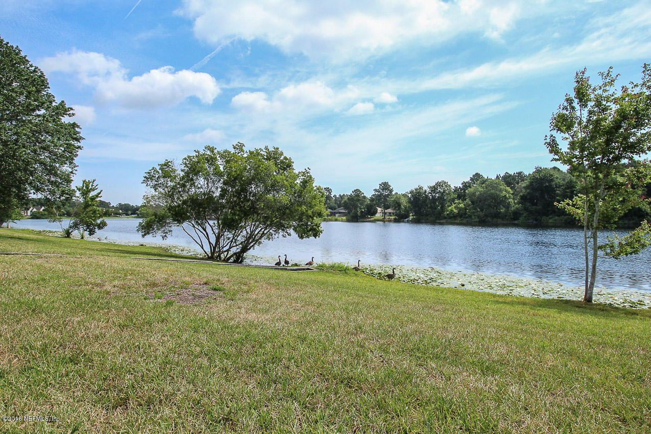 23583 Bahama Point Fernandina Beach, FL 32034 - Photo 37 of 37 a view of swimming pool and lake