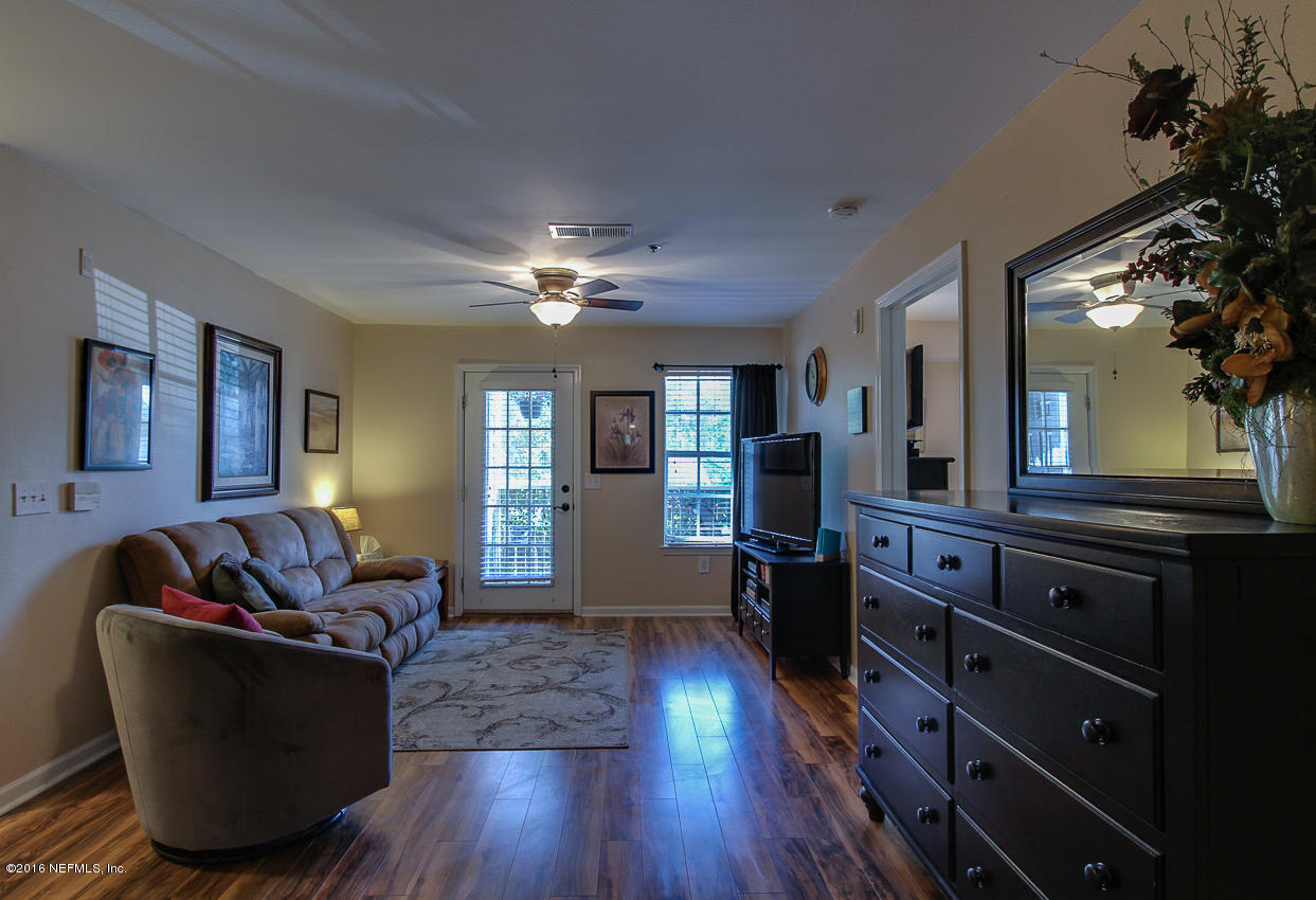 23583 Bahama Point Fernandina Beach, FL 32034 - Photo 4 of 37 a living room with furniture and a wooden floor