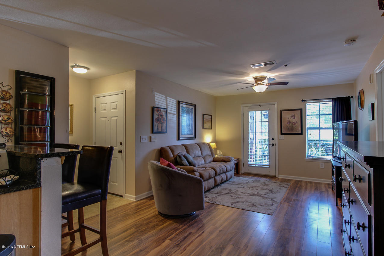 23583 Bahama Point Fernandina Beach, FL 32034 - Photo 5 of 37 a living room with furniture and wooden floor