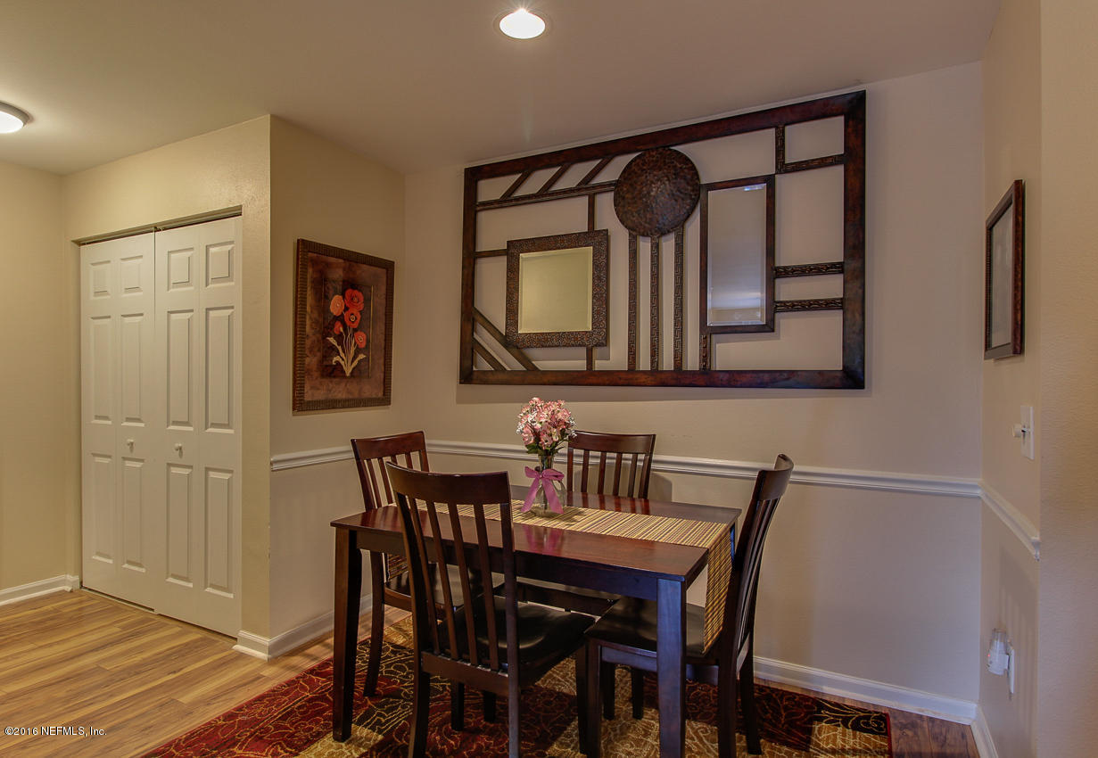 23583 Bahama Point Fernandina Beach, FL 32034 - Photo 9 of 37 a view of a dining room with furniture and wooden floor