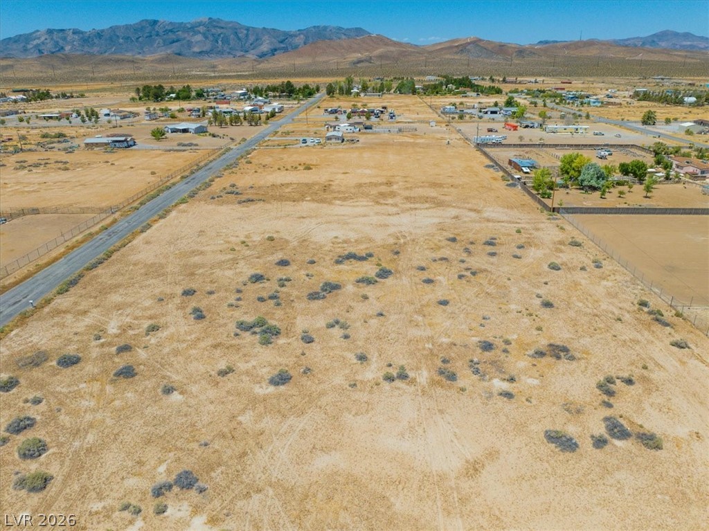 4610 Lawrence Road Pahrump, NV 89048 - Photo 24 of 42 A vast, undeveloped lot with distant mountain views awaits your vision.