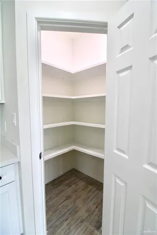 a view of a room with rack on the wall