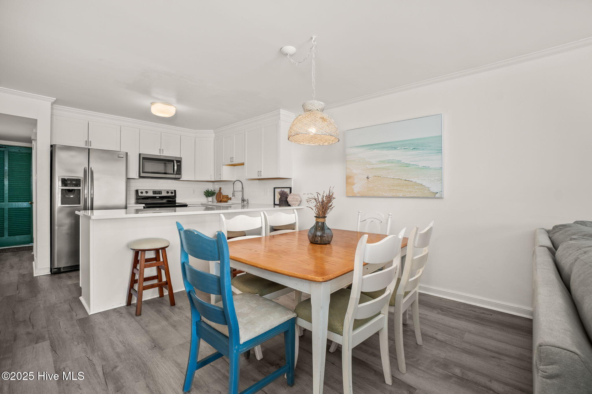 10300 Coast Guard Road, Unit C103 POINT EMERALD VILLAS Emerald Isle, NC 28594 - Photo 3 of 44 Central dining area