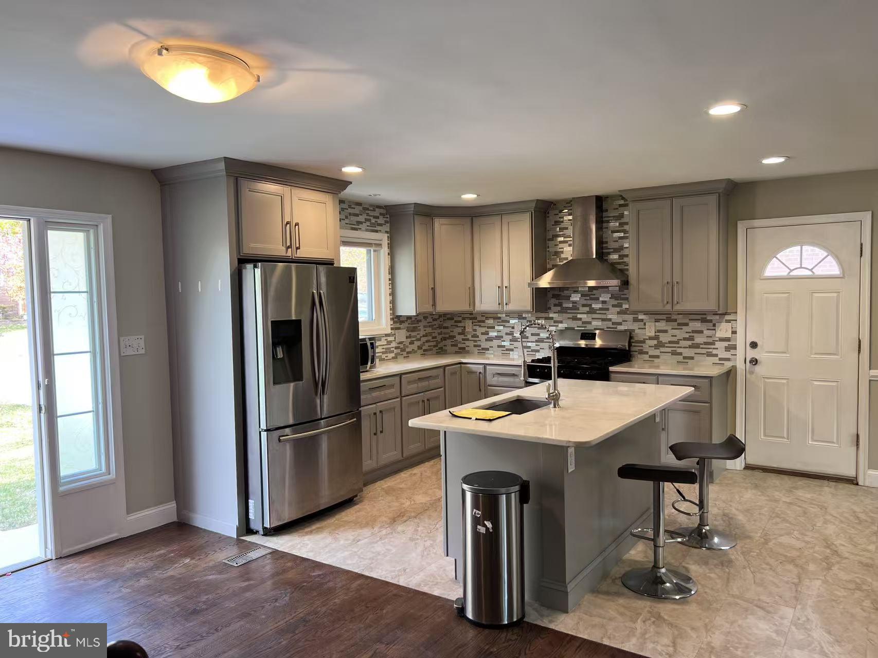 4106 Southend Road Rockville, MD 20853 - Photo 11 of 36 a kitchen with refrigerator and cabinets