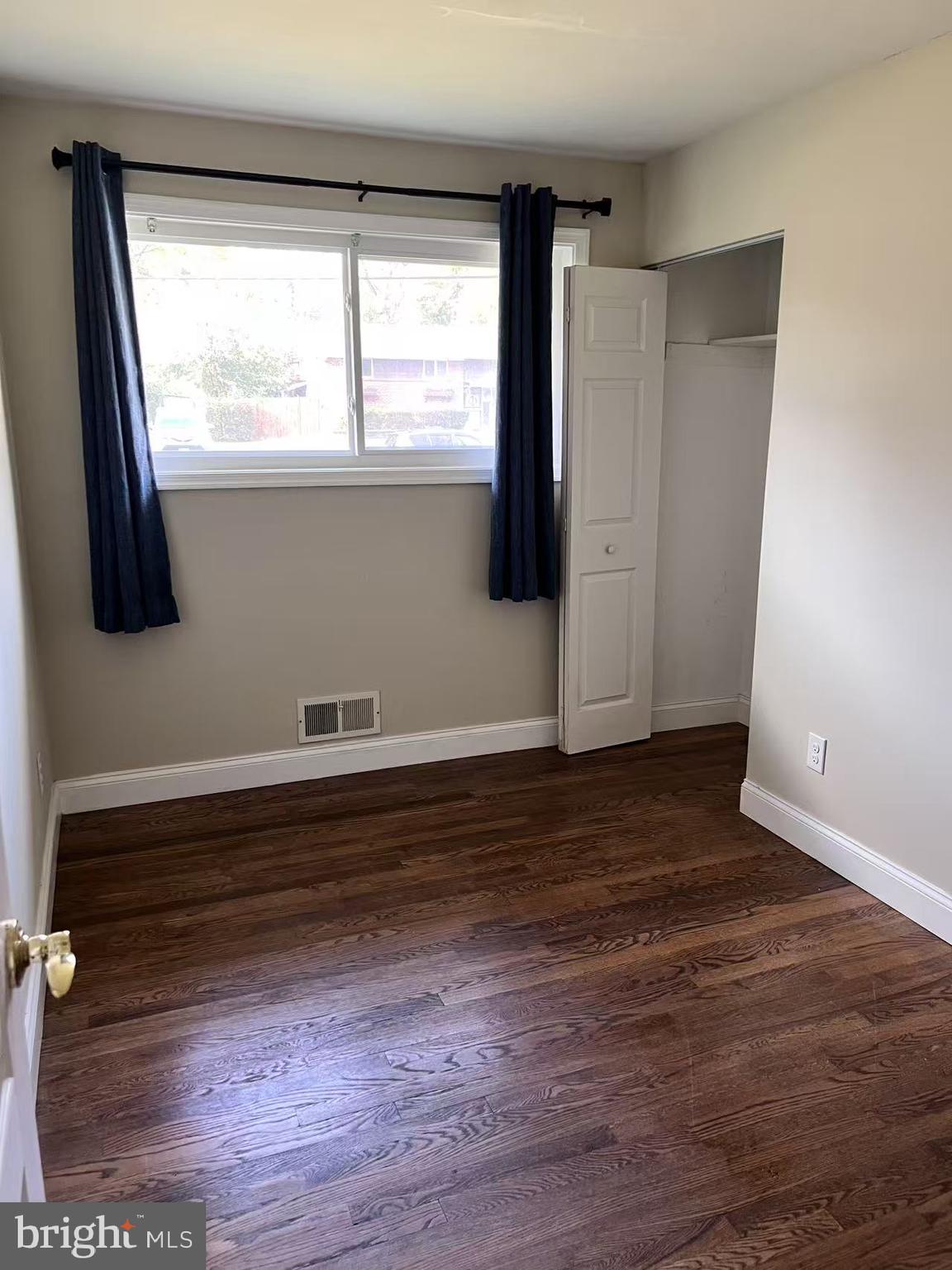 4106 Southend Road Rockville, MD 20853 - Photo 22 of 36 a view of room with window and wooden floor