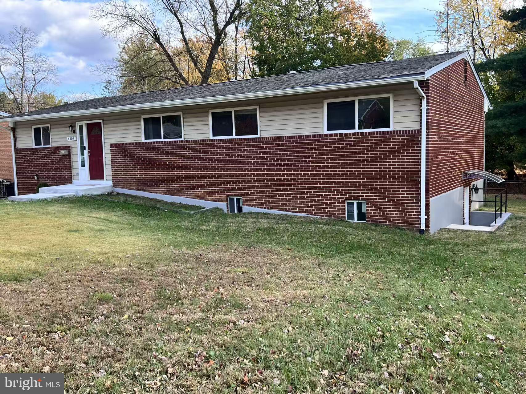 4106 Southend Road Rockville, MD 20853 - Photo 3 of 36 a view of a house with a yard