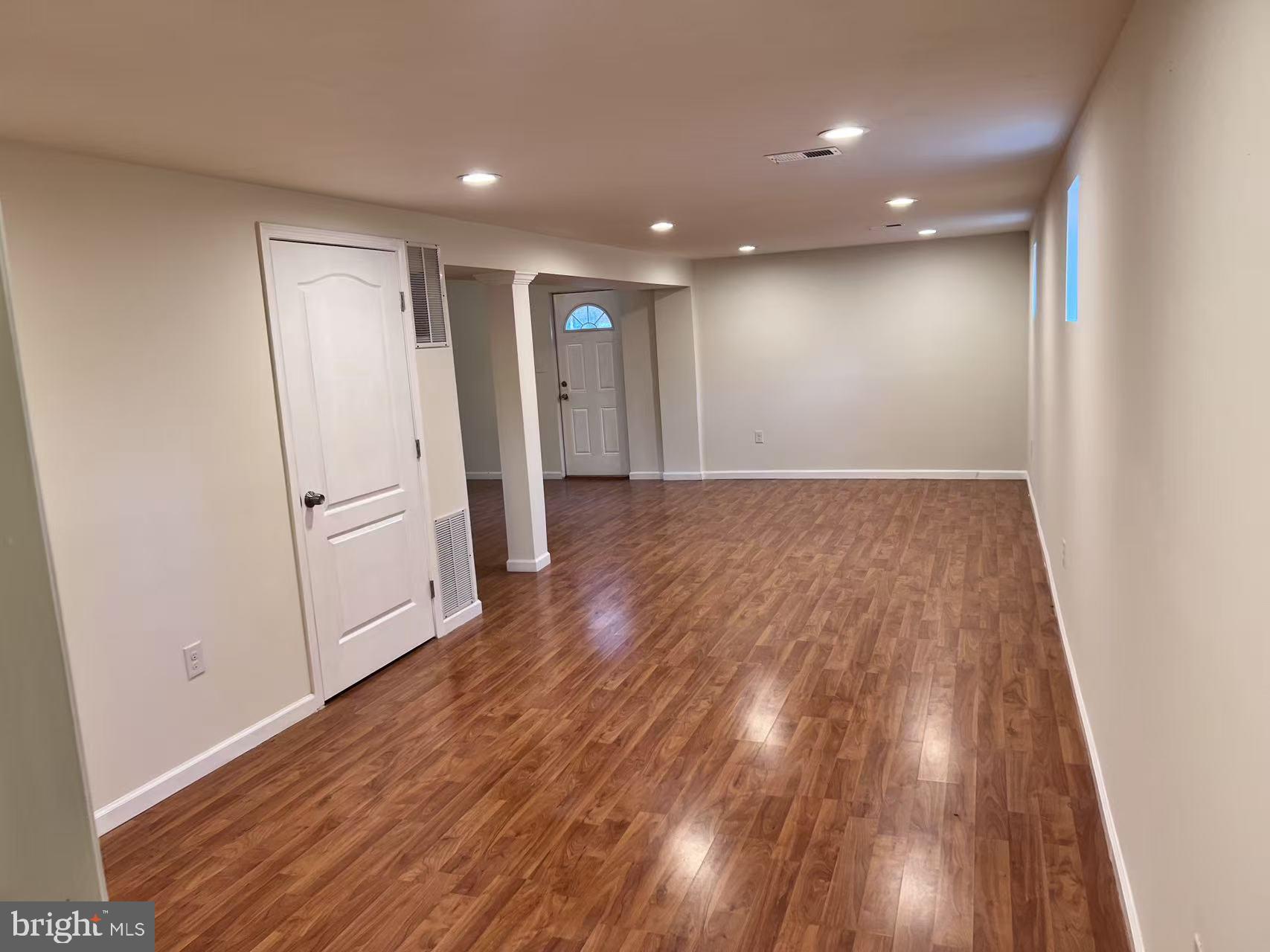 4106 Southend Road Rockville, MD 20853 - Photo 31 of 36 a view of hallway with wooden floor