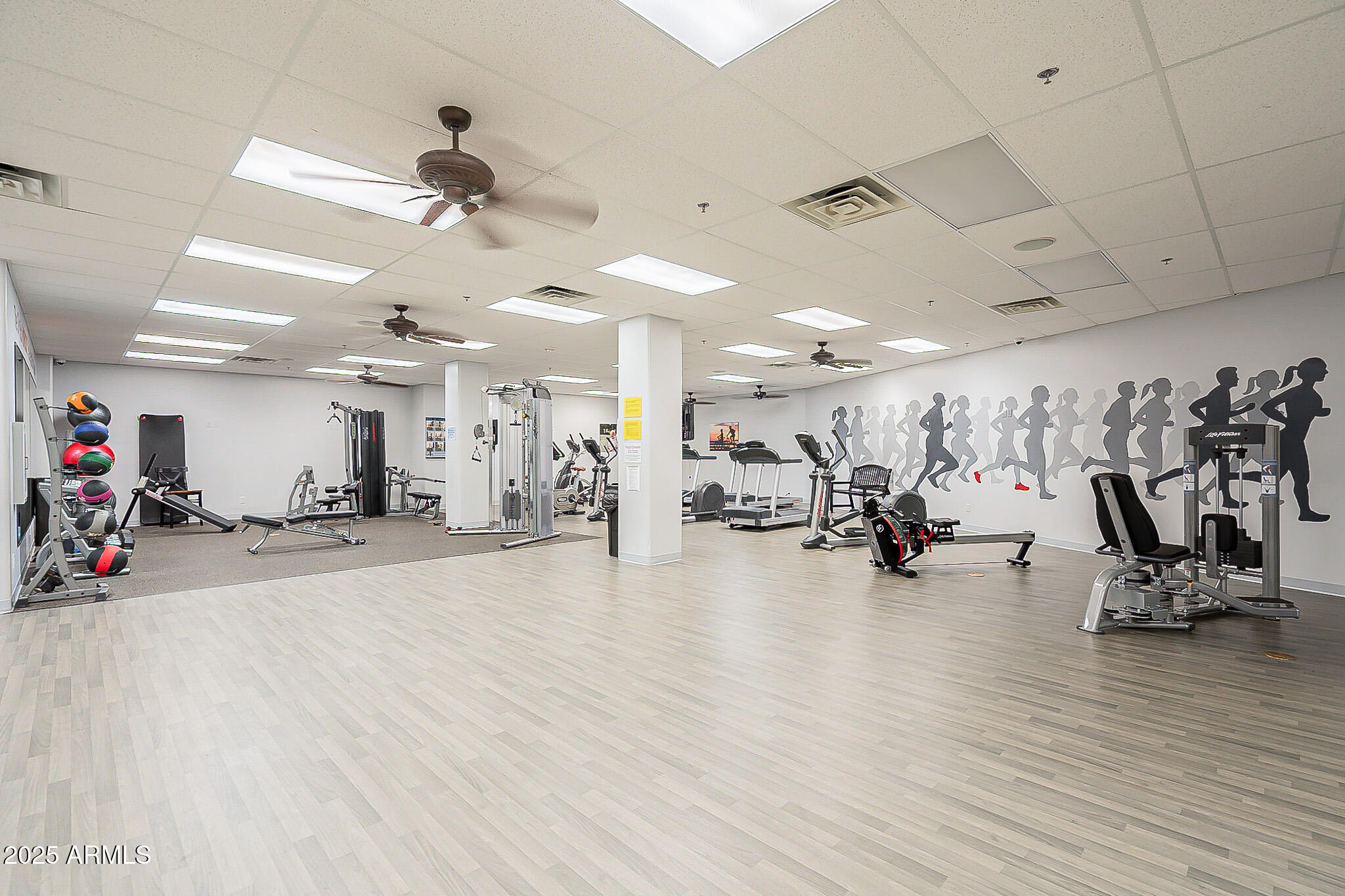 6202 East McKellips Road, Unit 83 Mesa, AZ 85215 - Photo 35 of 54 a view of a room with gym equipment