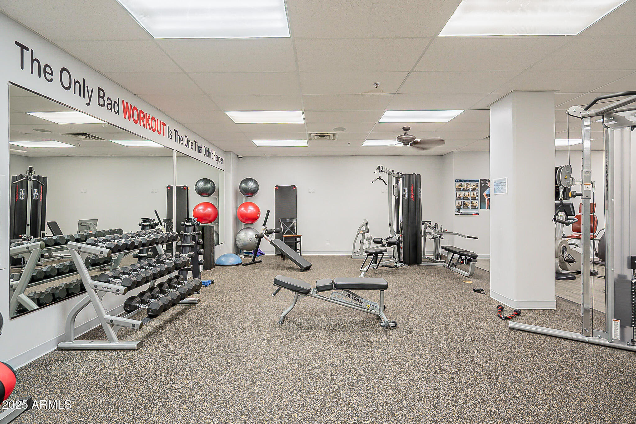 6202 East McKellips Road, Unit 83 Mesa, AZ 85215 - Photo 36 of 54 a very nice looking room with gym equipment