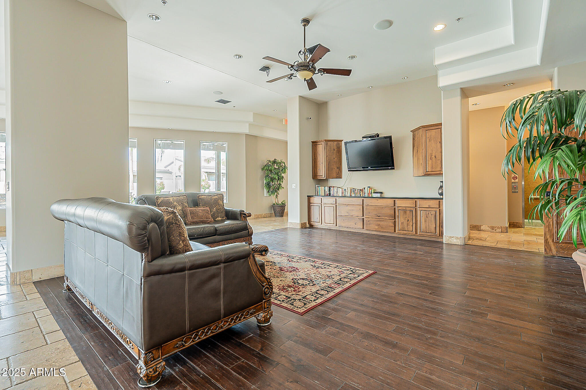 6202 East McKellips Road, Unit 83 Mesa, AZ 85215 - Photo 42 of 54 a living room with furniture and a flat screen tv