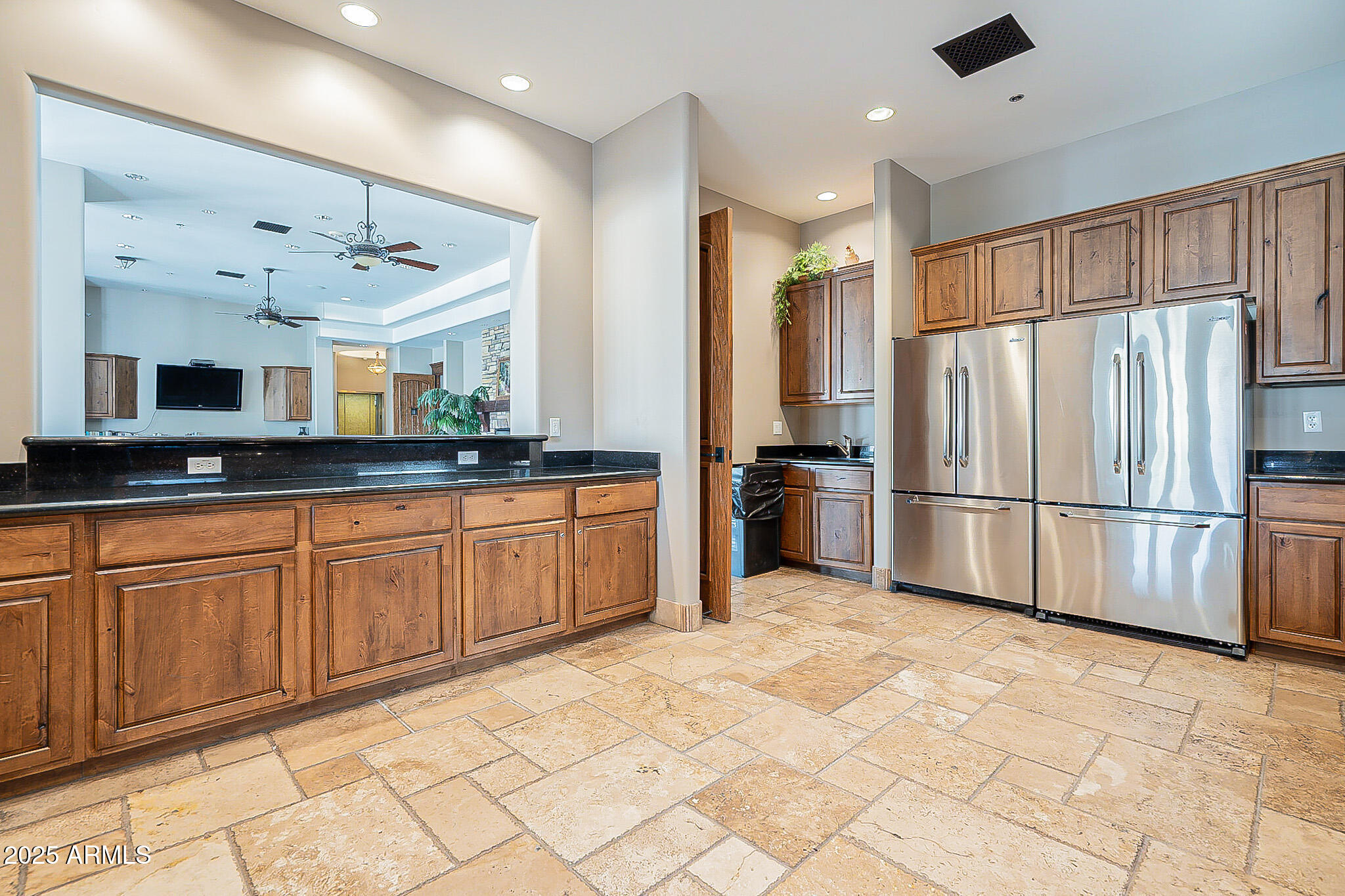 6202 East McKellips Road, Unit 83 Mesa, AZ 85215 - Photo 44 of 54 a large kitchen with stainless steel appliances a refrigerator and a sink