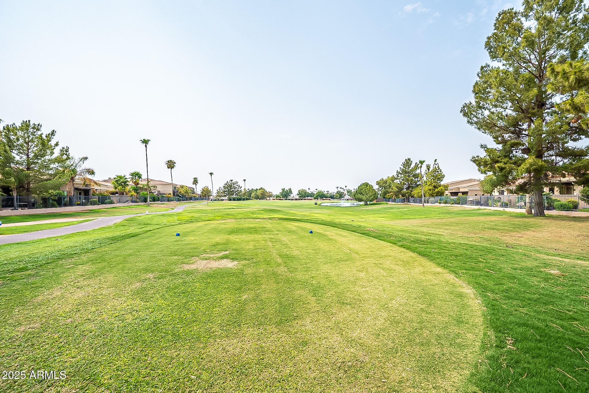 6202 East McKellips Road, Unit 83 Mesa, AZ 85215 - Photo 50 of 54 a view of a big yard with large trees