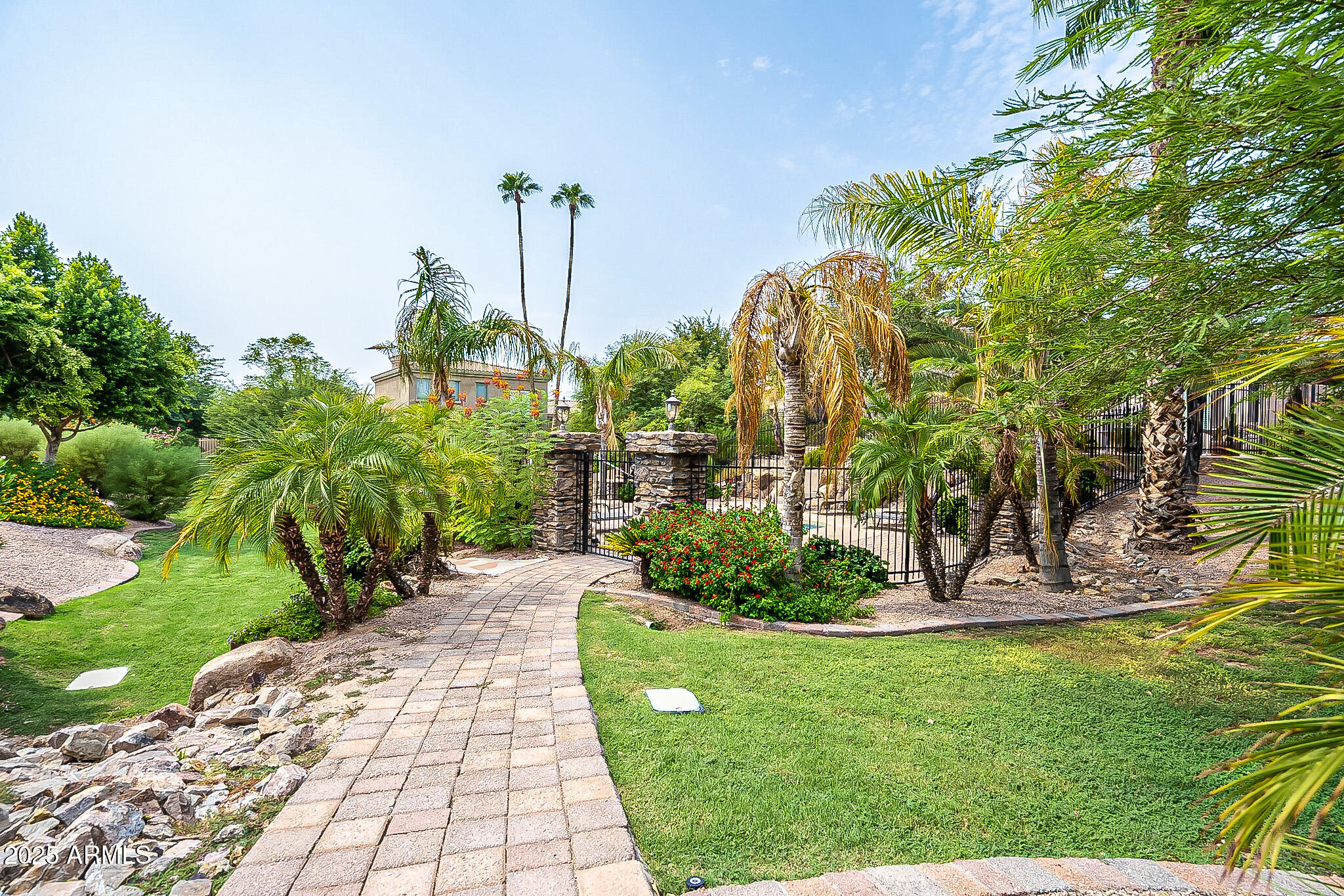 6202 East McKellips Road, Unit 83 Mesa, AZ 85215 - Photo 52 of 54 a view of a garden with a fountain