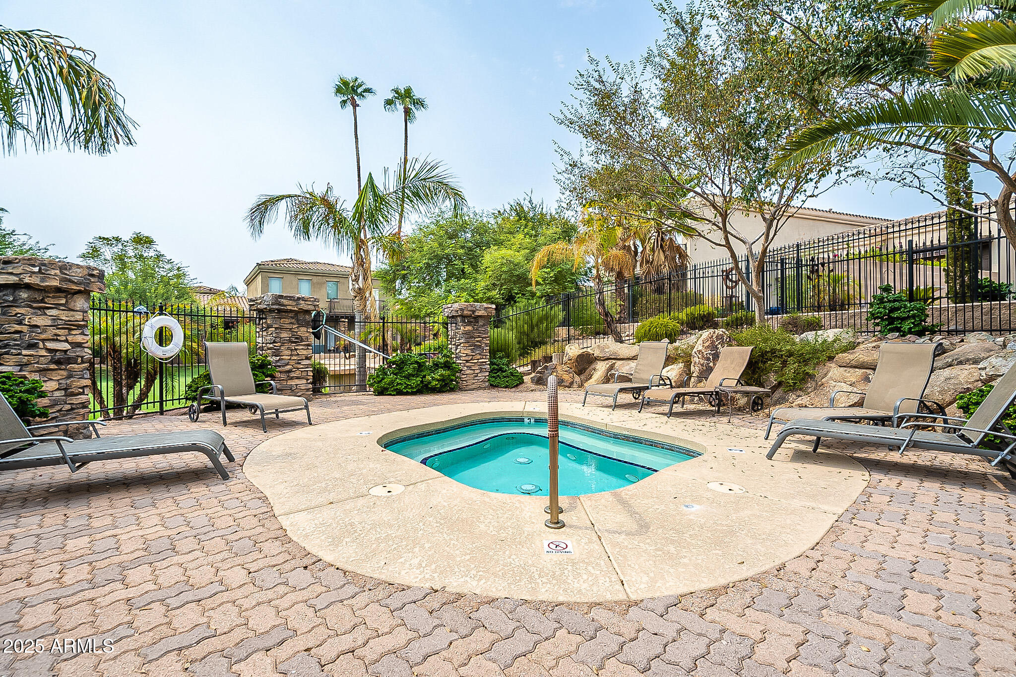 6202 East McKellips Road, Unit 83 Mesa, AZ 85215 - Photo 53 of 54 a view of a swimming pool with a patio