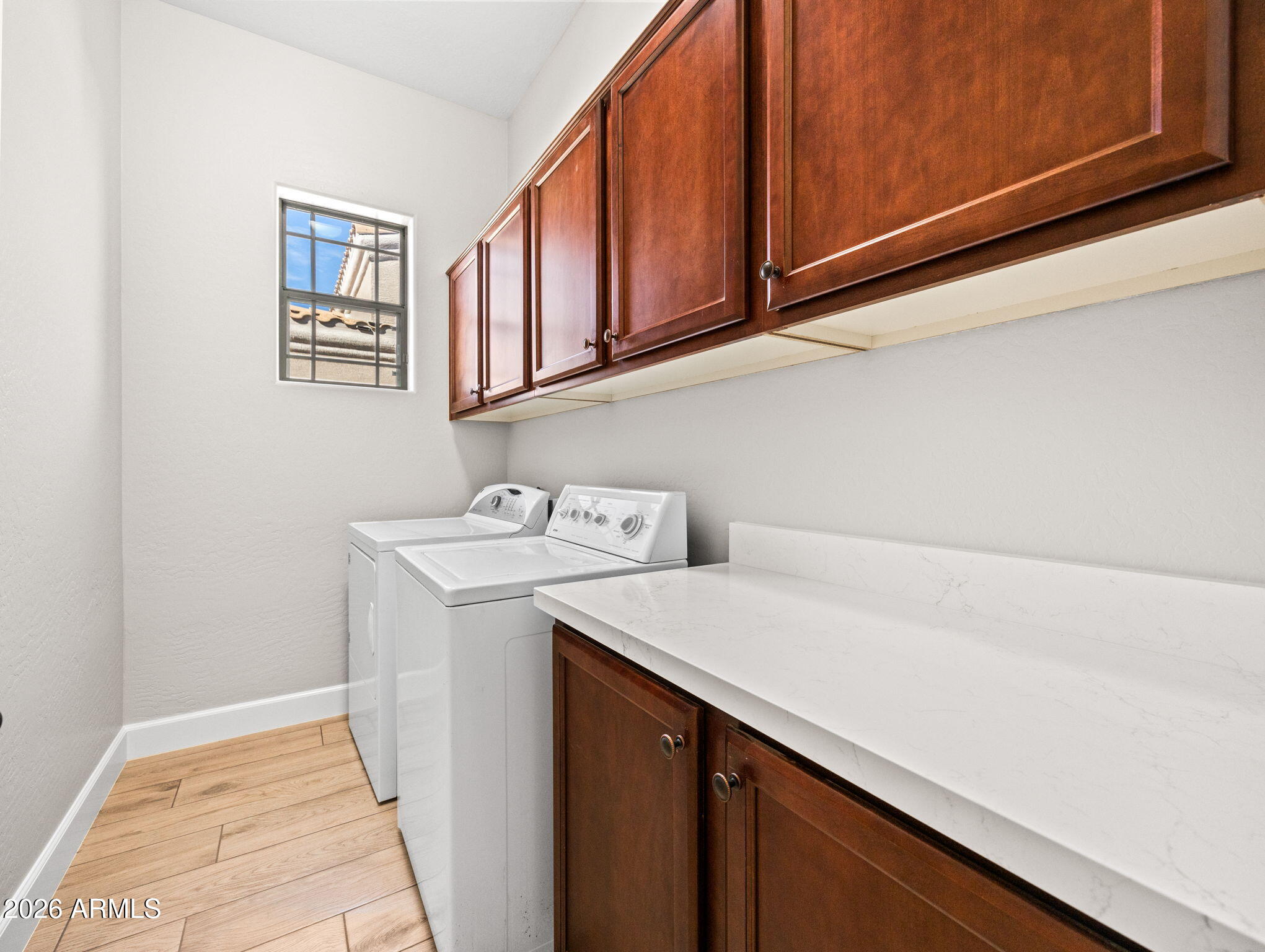6202 East McKellips Road, Unit 83 Mesa, AZ 85215 - Photo 8 of 54 a utility room with dryer and washer