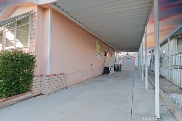 a view of a house with a street