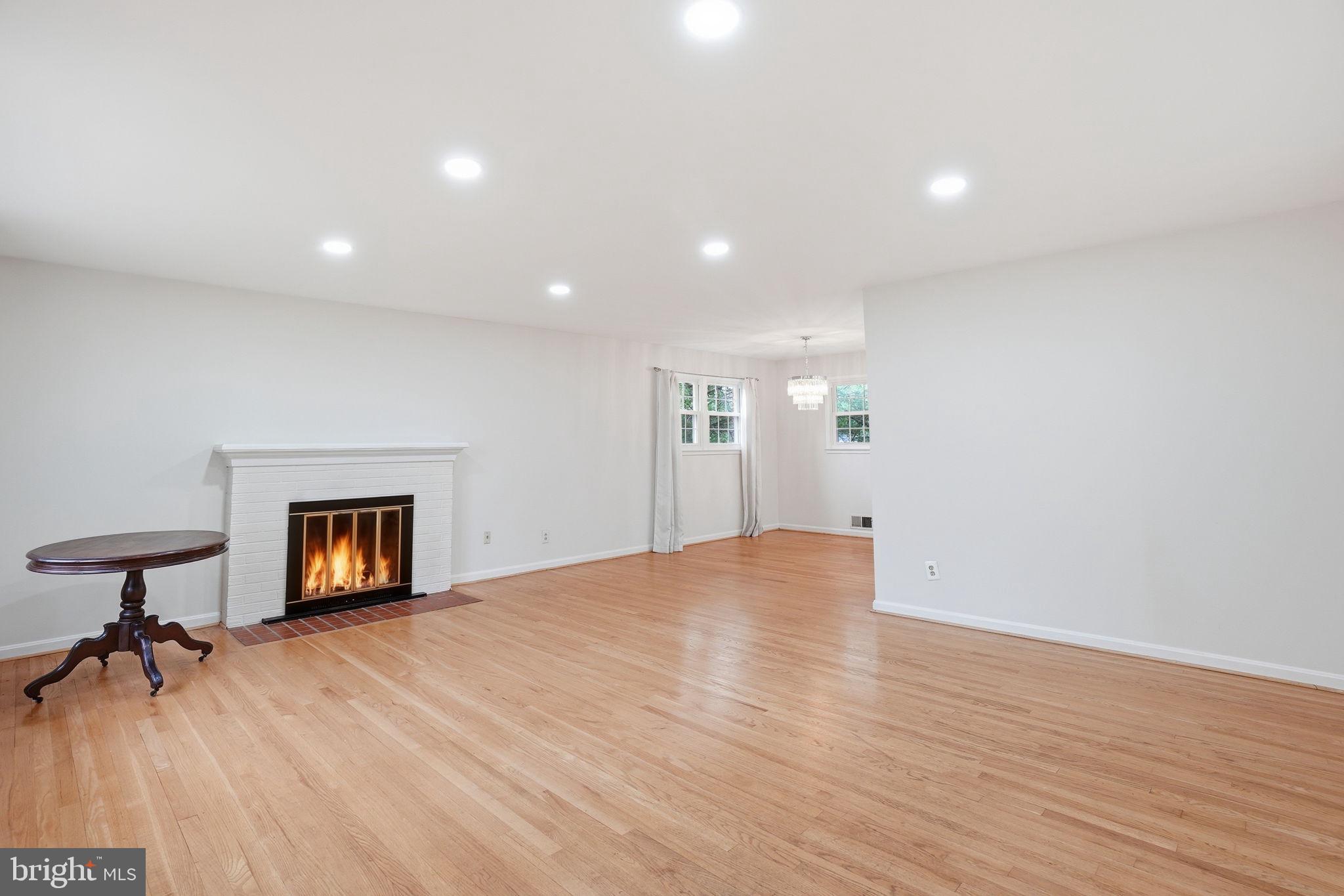 5304 Pillow Lane Springfield, VA 22151 - Photo 2 of 32 a view of an empty room and a fireplace