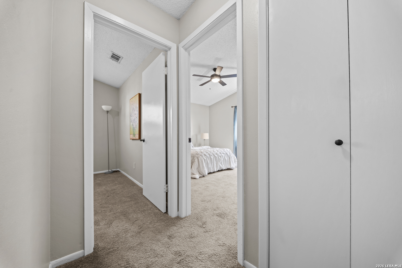 829 West Bitters Road, Unit 502 San Antonio, TX 78216 - Photo 15 of 29 a view of a hallway with closet and a glass door