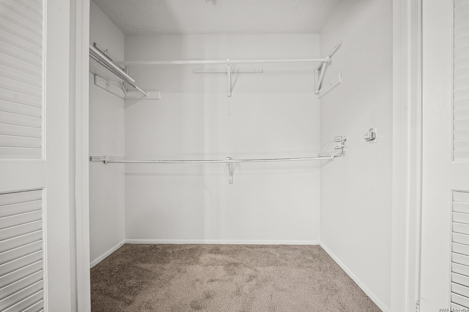829 West Bitters Road, Unit 502 San Antonio, TX 78216 - Photo 18 of 29 a view of an empty walk in closet