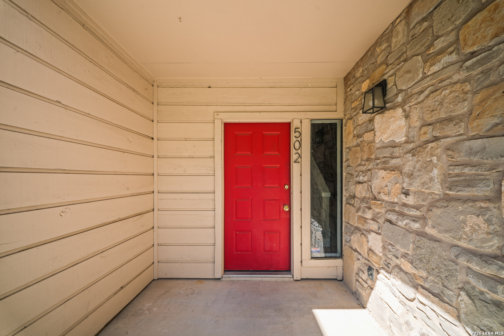 829 West Bitters Road, Unit 502 San Antonio, TX 78216 - Photo 2 of 29 a view of a door and wooden wall