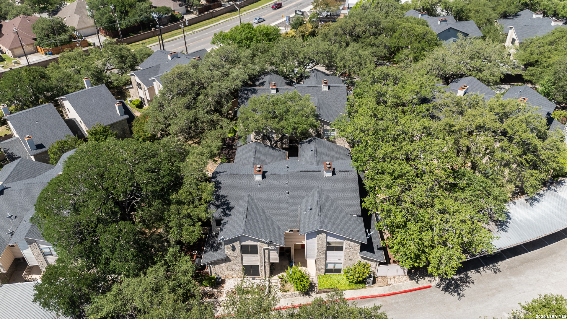 829 West Bitters Road, Unit 502 San Antonio, TX 78216 - Photo 27 of 29 an aerial view of a house with a yard