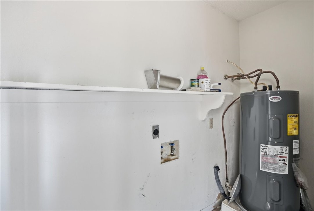 126 Kerry Drive George West, TX 78022 - Photo 19 of 30 a bathroom with a sink and mirror with toilet