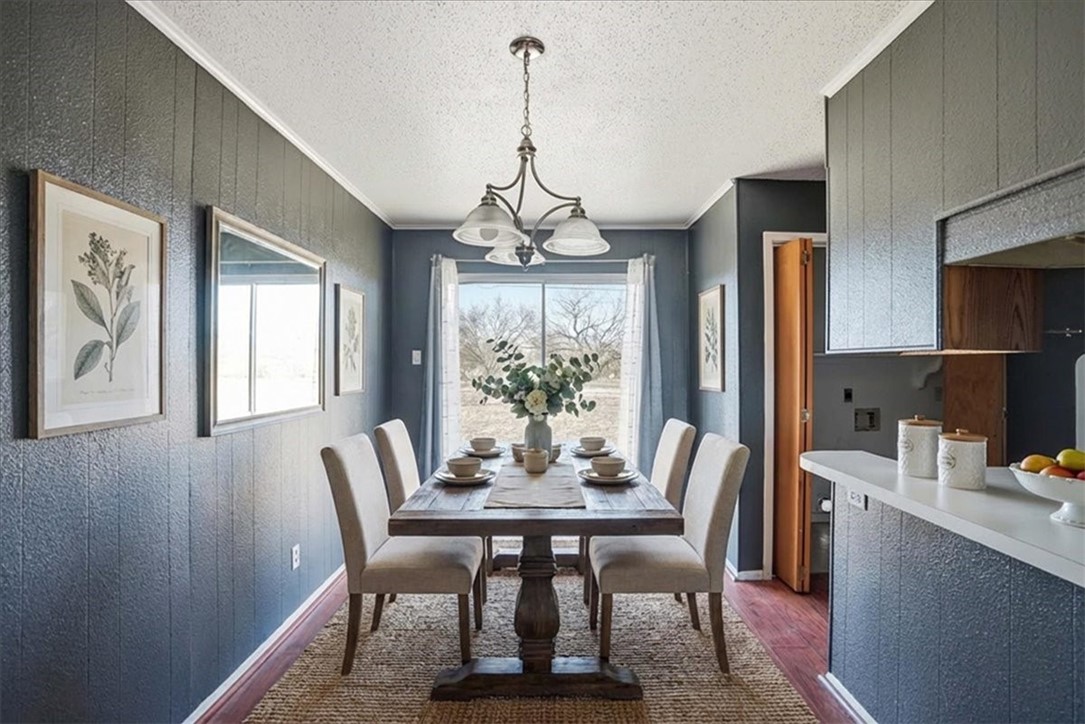 126 Kerry Drive George West, TX 78022 - Photo 10 of 30 a view of a dining room with furniture window and outside view