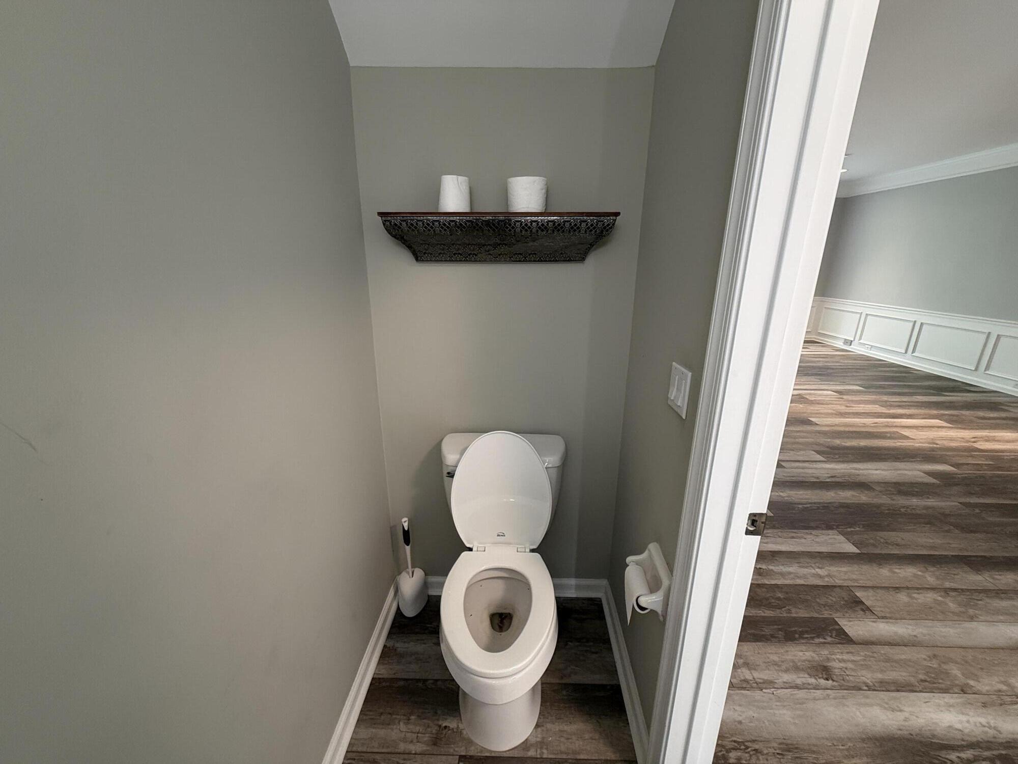 21543 St Andrews Grand Circle, Unit 41 Boca Raton, FL 33486 - Photo 12 of 27 a bathroom with a toilet and a sink
