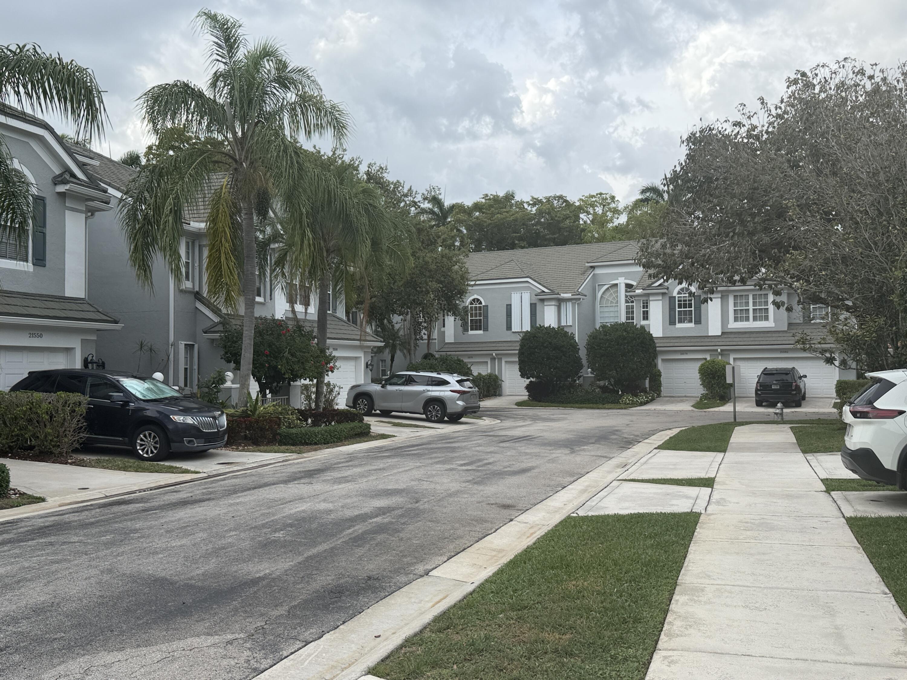 21543 St Andrews Grand Circle, Unit 41 Boca Raton, FL 33486 - Photo 24 of 27 a view of a house with a patio