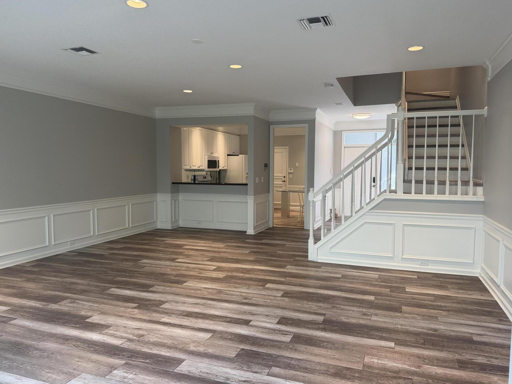 21543 St Andrews Grand Circle, Unit 41 Boca Raton, FL 33486 - Photo 10 of 27 a view of an empty room with stairs and ventilation