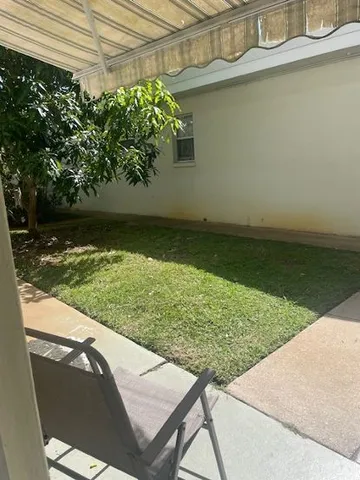 a house view with a outdoor space