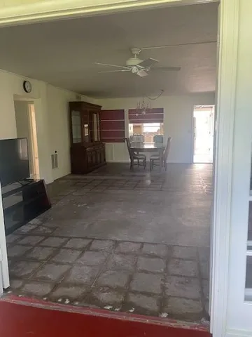 a view of a livingroom with furniture