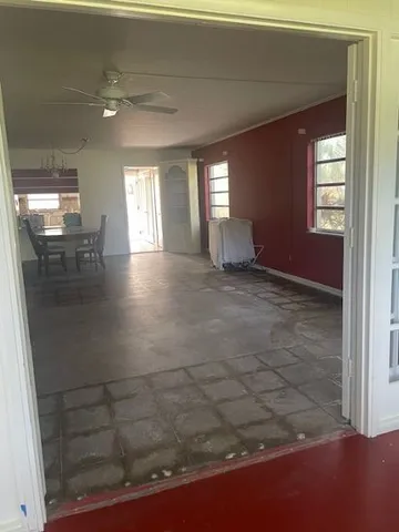 a kitchen with stainless steel appliances a refrigerator and a stove top oven