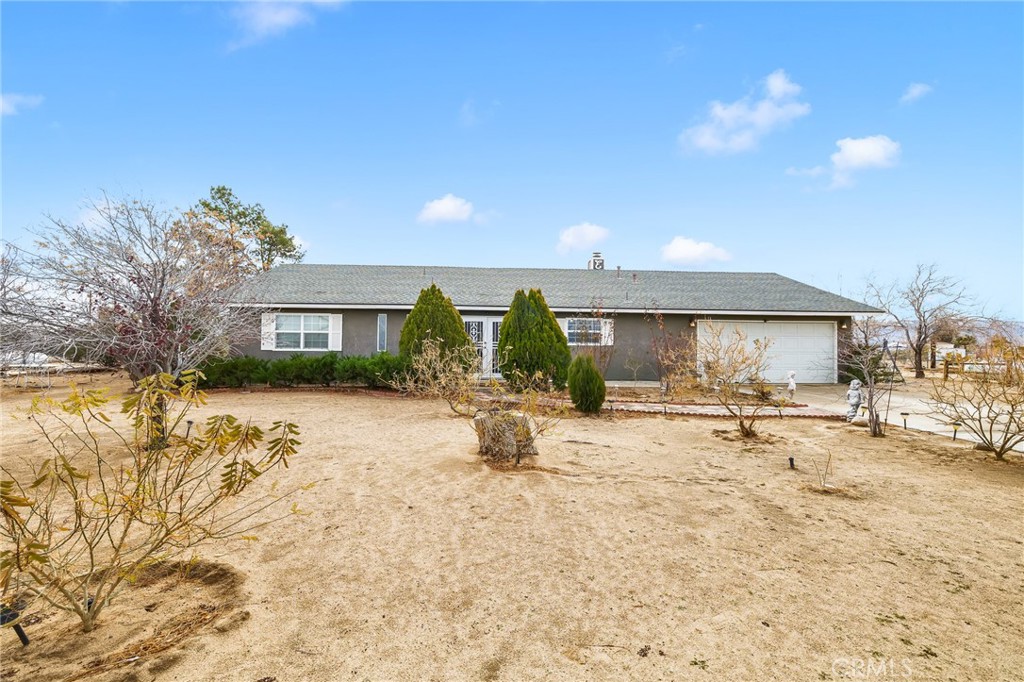 6273 Bonanza Road Phelan, CA 92371 - Photo 1 of 1 a view of a house with snow on the ground