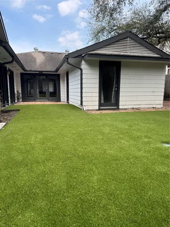 a view of a house with a garden