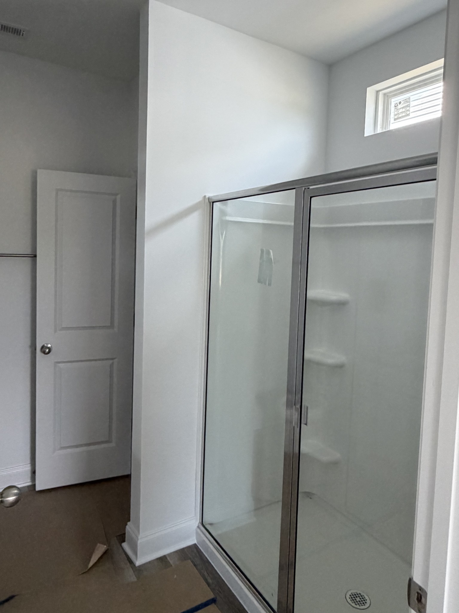 1209 Euclid Murfreesboro, TN 37127 - Photo 10 of 14 a bathroom with a glass shower door