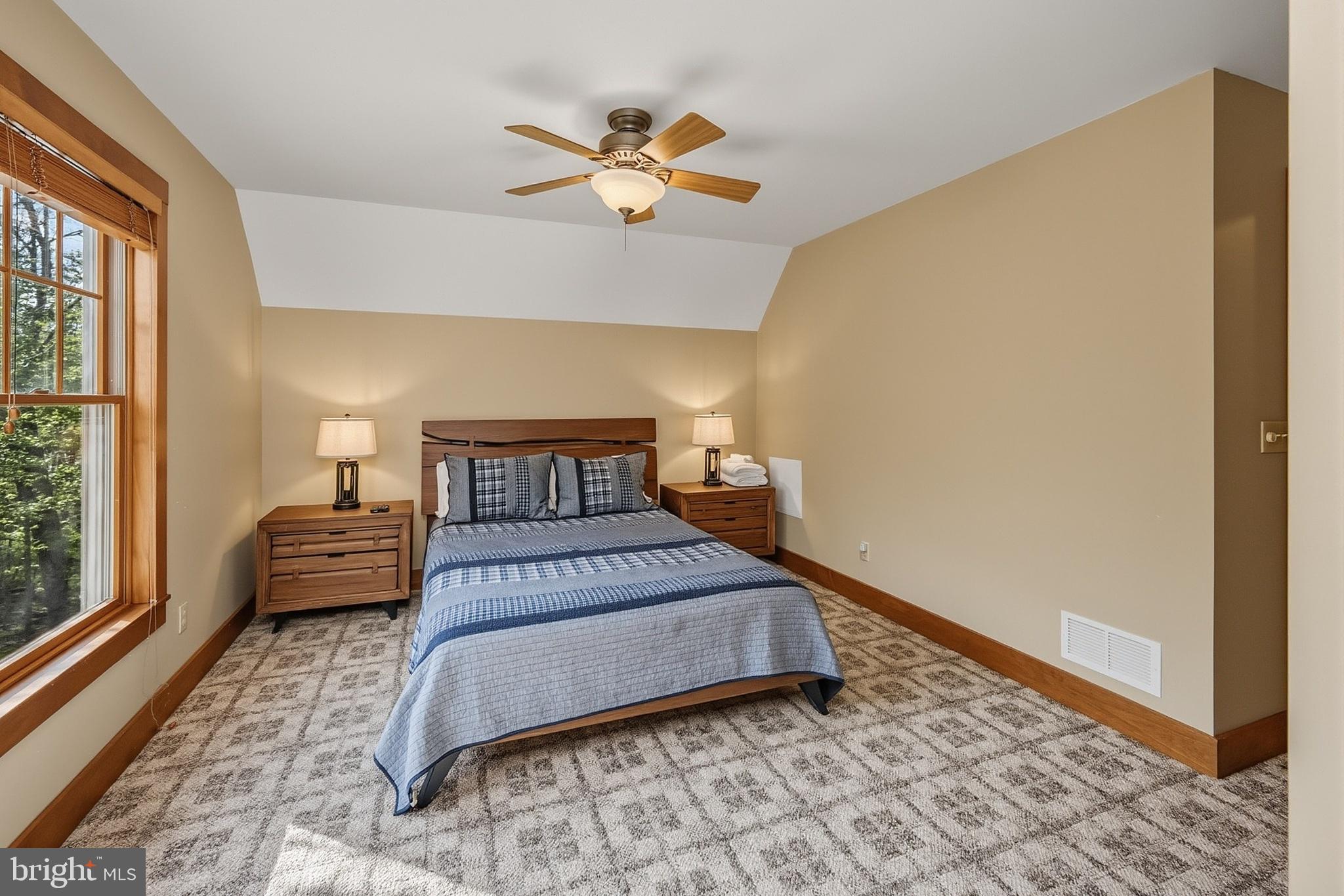 185 Ruta Lane Swanton, MD 21561 - Photo 61 of 81 a bedroom with a bed and wooden floor