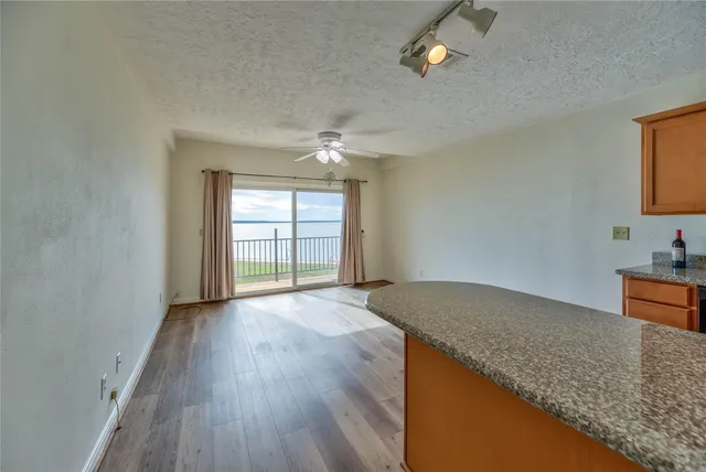 a view of a room with a large window