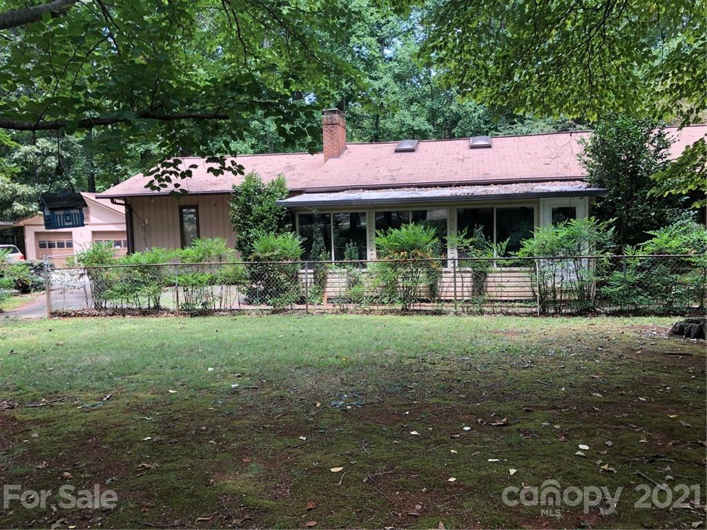 4797 Asbury Church Road Lincolnton, NC 28092 - Photo 1 of 19 a backyard of a house with barbeque oven