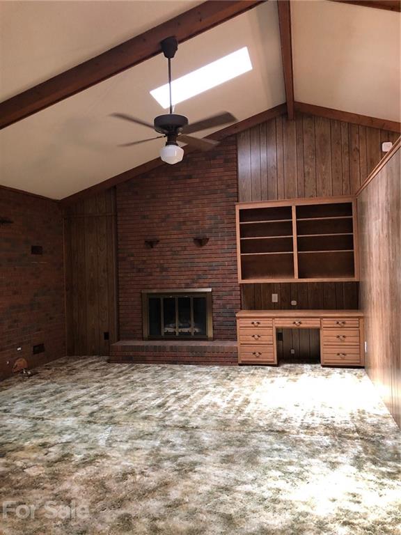 4797 Asbury Church Road Lincolnton, NC 28092 - Photo 15 of 19 a view of an empty room with fireplace and a window